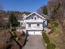 Stilvoll wohnen mit Seeblick, Garten, Balkon und Doppelgarage in Krumpendorf.