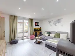 Wohnglück mit Ofenwärme &amp; Sonnenbalkon - Modernisierte 3-Zimmer-Balkonwohnung in Saalfelden
