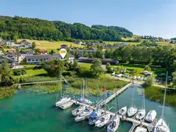 Moderne 2-Zimmer-Wohnung in Mattsee: Erstbezug mit Balkon und Seezugang