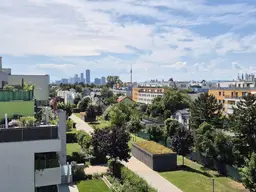 PREISREDUKTION! Neuwertige 2-Zimmer-Wohnung mit 19m² Dachterrasse und Fernblick