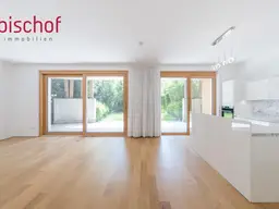 Großzügige 3 Zimmer-Wohnung mit überdachter Terrasse und Gartenanteil