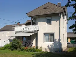 Zeitloses Mehrfamilienhaus in Top Lage - samt gewissem Extra!
