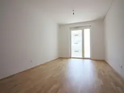 MODERNE 2-ZIMMER-WOHNUNG MIT GROSSEM BALKON UND TIEFGARAGENPLATZ