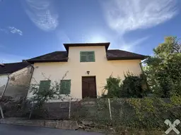 Stark sanierungsbedürftiges Einfamilienhaus auf sonnigem Grundstück im Ortskern von Kumberg