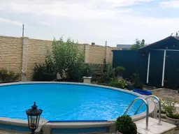 STILVOLLES ZIEGELMASSIVHAUS IN GRÜNRUHELAGE MIT POOL IN TRUMAU