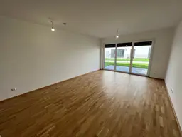 Moderne Mietwohnung mit Garten