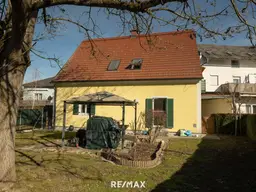 Eigentumswohnung mit Garten, Terrasse und Parkplatz - EG