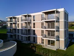 NEUBAU - 3-Zimmer-Wohnung mit Küche, Balkon und Tiefgaragenparkplatz - geförderte Miete - 3 Zimmer 