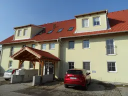 GARTENWOHNUNG in SCHNELLBAHNNÄHE mit Fußbodenheizung, Parkplatz und großem Kellerabteil