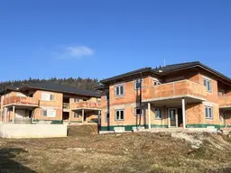 Neubauwohnung mit sonniger Terrasse und Eigengarten