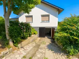 Liebliches Einfamilienhaus mit großem Garten in Siedlungslage