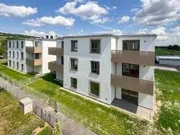 Südwestseitige Erstbezugswohnung mit großen Garten