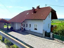 Traumhaftes Einfamilienhaus mit Weitblick in Hanglage – Zwei Wohneinheiten mit viel Potenzial