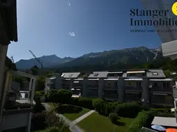 VERKAUF - Ruhig gelegene 2-Zimmer-Wohnung mit Blick auf die Berge, 2 Balkone und TG-Abstellplatz 