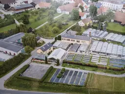 Das etwas größere Anwesen mit Wohngebäuden, Hallen und Garagen