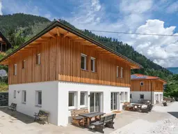 Etabliertes Ferienhaus-Ensemble am Millstätter See. Zwei moderne Häuser mit bestehender Vermietung. Investment.