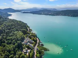 Klagenfurt-Maiernigg: 4-ZI-Seewohnung mit einzigartiger Aussicht, XL-Terrasse, Seezugang &amp; 2 Garagen
