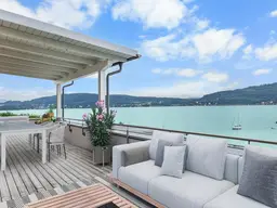 Klagenfurt-Maiernigg: 4-ZI-Seewohnung mit einzigartiger Aussicht, XL-Terrasse, Seezugang &amp; 2 Garagen