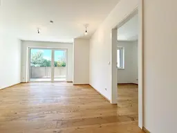 Erstbezug nahe der UNO-City – Traumhafte Wohnung mit Freifläche · inkl. Küche