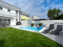 Traumhafte Doppelhaushälfte in Rutzing – Modernes Wohnen mit Pool, Kamin und großzügigem Garten!