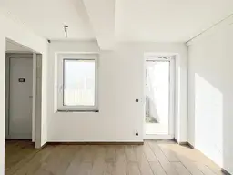 Moderne Neubau-3-Zimmer-Wohnung mit Garten und Carport inkl. PV-Anlage!