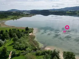 Grundstück mit Tinyhaus auf Rädern am Wallersee – perfekt zum Entspannen oder Vermieten!