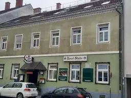 Sanierungsbedürftiges Wohn- und Geschäftshaus mit hoher Baureserve