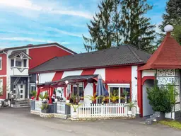 Großzügiges Mehrfamilienhaus mit vielseitigem Wohnkonzept und charmantem Gartenparadies