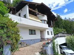 Haus in 0mes 180m² mit Garten, Garage und atemberaubendem Bergblick!