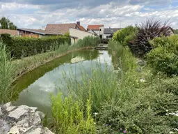 PROVISIONSFREI für den Käufer! - Badeparadies im eigenen Garten - Einfamilienhaus mit großem Garten, idyllischem Badeteich, bewohnbaren Nebenflächen, Weinkeller und vieles mehr in Unterretzbach