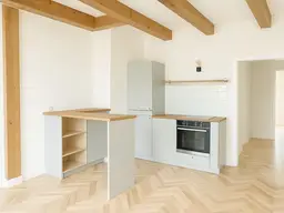Schmuckstück am Fuße des Schlossbergs: Wunderschön sanierte 2-Zimmer Dachgeschoss-Wohnung in zentraler Lage Graz!