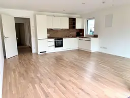 2-Zimmer-Gartenwohnung mit Einbauküche und sonniger Loggia!