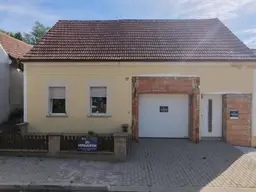 Mehr dahinter, als man von außen erwartet. | € 104.500,- | uneinsehbarer Innenhof | 31 m² Garage | bereits teilweise modernisiert