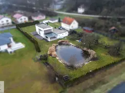 Jeden Tag ein Stück Urlaub – modernes Passivhaus mit Natur-Schwimmteich auf 3.149 m² Eigengrund
