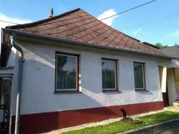 NEUER PREIS !!! Attraktive Gelegenheit für Käufer mit Blick für Potenzial – Einfamilienhaus mit Nebengebäude in Karlsdorf