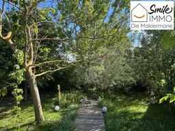 Ziegelmassives Famosa (NOVUS) Einfamilienhaus mit beheizter, ausgebauter Vollunterkellerung und traumhaftem Naturgarten (470m² Eigengrund)