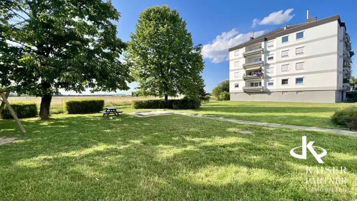Hausansicht + Gemeinschaftsgarten
