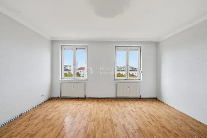 Wohnzimmer mit Blick über die Dächer