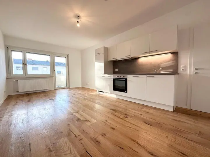 Wohnzimmer mit Küche