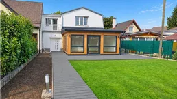Modernisiertes Einfamilienhaus mit Holz-Wintergarten und großem Garten in Grünruhelage