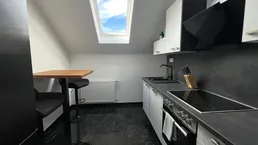 Modernisierte Dachgeschosswohnung mit Balkon &amp; Blick auf die Burgruine Kirchschlag