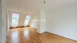 Helle Dachgeschosswohnung mit großzügiger Terrasse und Grünblick in Währing