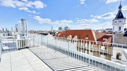 Eleganz trifft Lage – Neubau-Dachgeschosswohnung in Toplage
