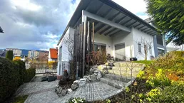 Traumhaus in Villach: TOP-Lage am Drau-Ufer mit unverbaubarem Bergblick und angrenzenden Park