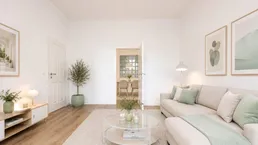 Helles, modern eingerichtetes Wohnzimmer mit beigem Sofa, Holzboden und Blick in den Essbereich.