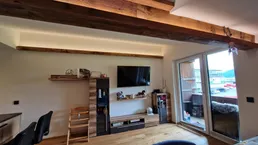 Vollständig renovierte 1-Raum-DG-Wohnung mit Balkon und Einbauküche in Sankt Johann in Tirol