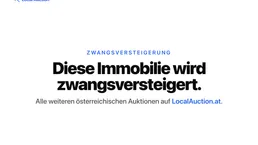 Mehrfamilienhaus mit Garagen