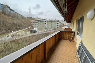 Ruhig gelegene Familienwohnung mit sonnigem Balkon und 2 Parkplätzen