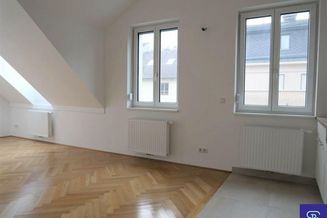 Moderne DG-Wohnung mit Einbauküche in Grünlage - 1230 Wien