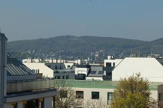 Dachterrassentraum mit Fernblick: 3 Zimmer Wohnung mit Tiefgaragenplatz